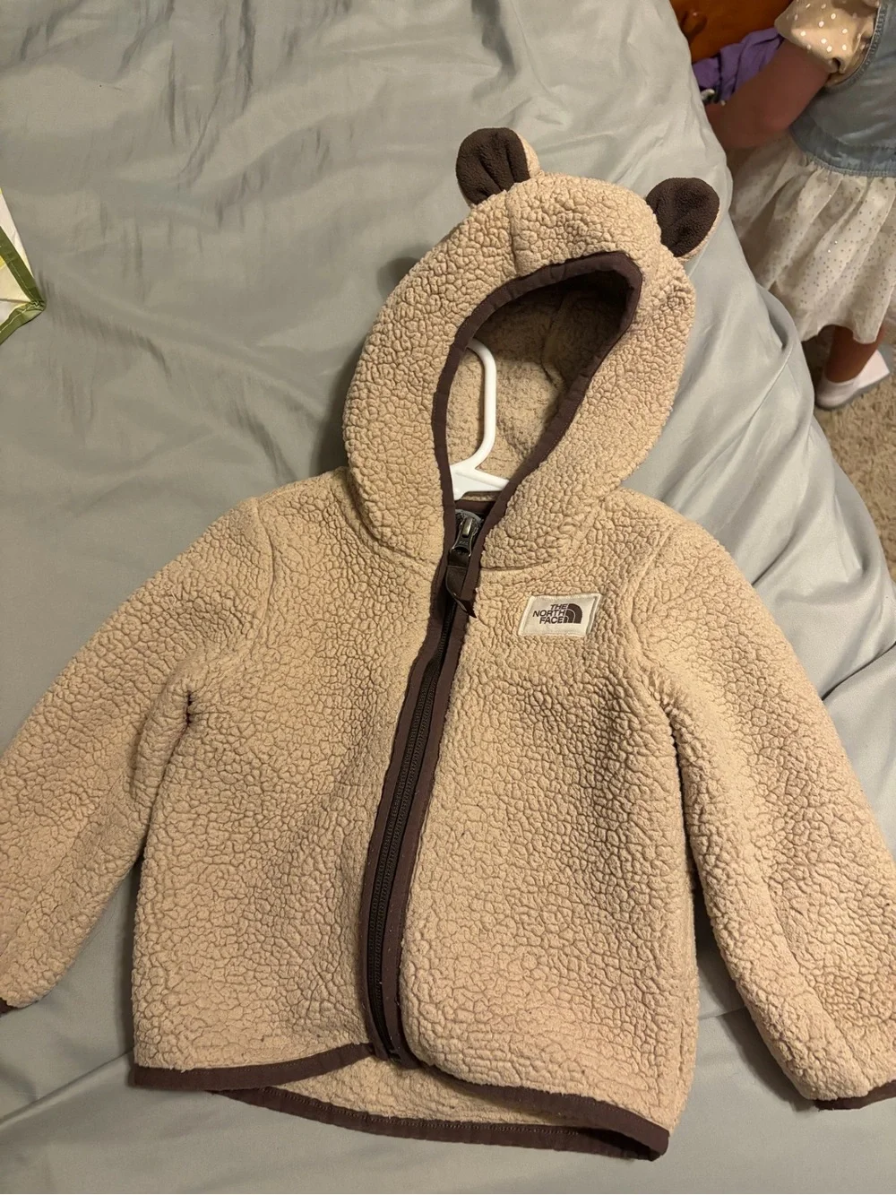 The North Face Infant Teddy Fleece Hoodie in Beige with Brown Trim
